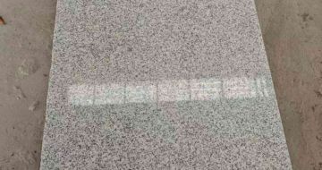 百色芝麻白光面毛板